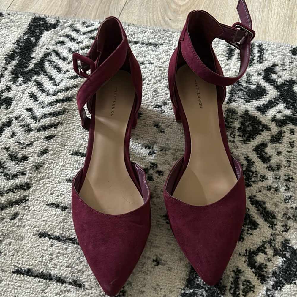 Maroon chunky heels.